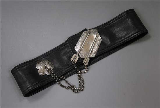 A Victorian military silver cross belt pricker, with chain and flower terminal